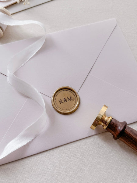 custom initials monogram gold wax seal with border design