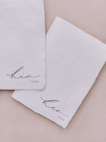 white handmade paper His and Her vow books tied in white twine