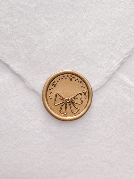 Christmas ribbon bow gold wax seal