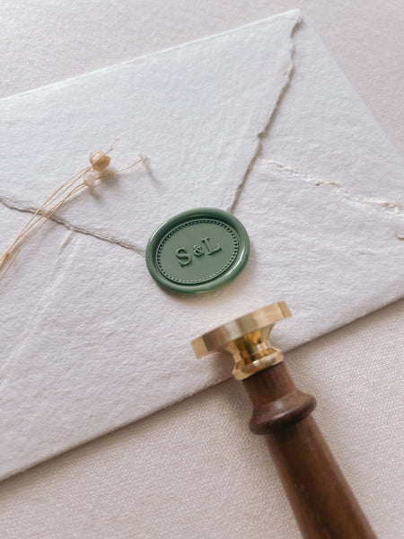 horizontal oval custom initials green wax seal