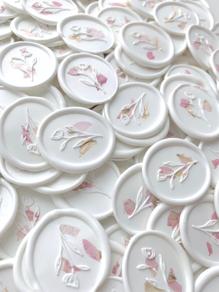 a bundle of white oval wax seal sticker with blush color dried petals