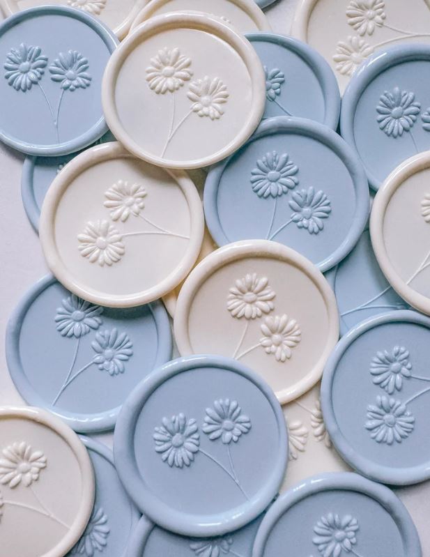 Daisie wax seals in light blue and off-white