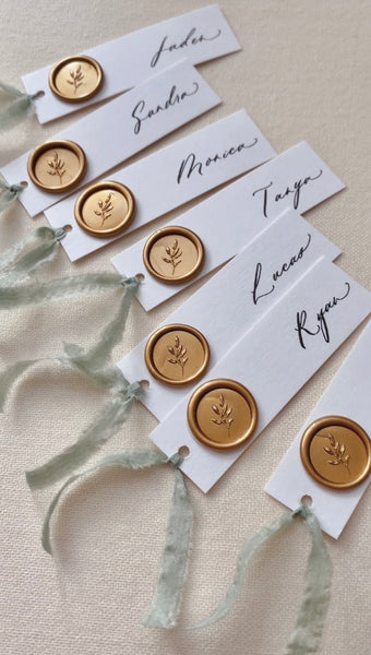 Mini 3D leaf wax seal in gold on hand lettered calligraphy place cards 