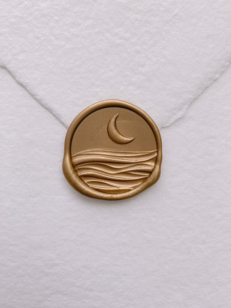 3D moonlight wax seal in gold on handmade paper envelope