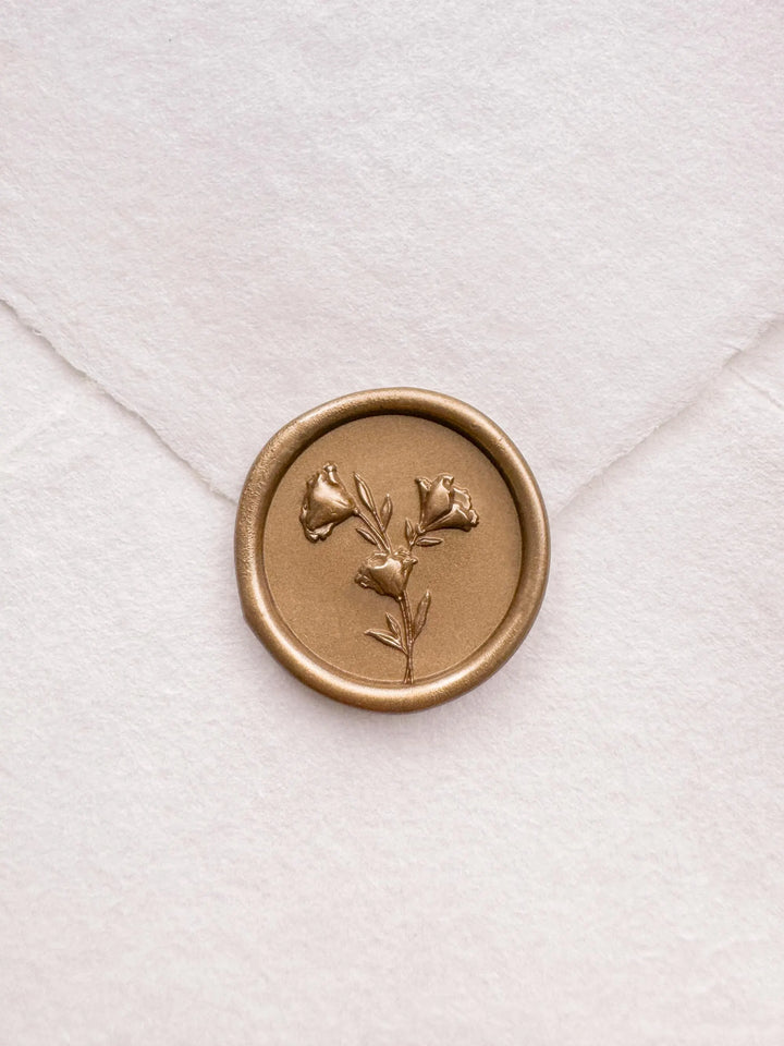 gold floral wax seal with 3D engraving details