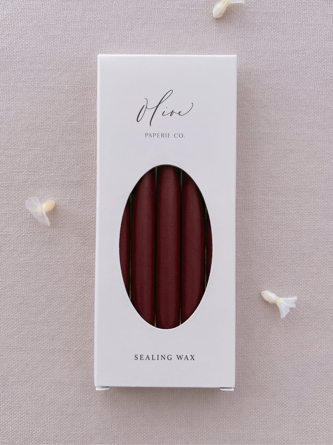 A pack of five dark red burgundy glue gun sealing wax sticks