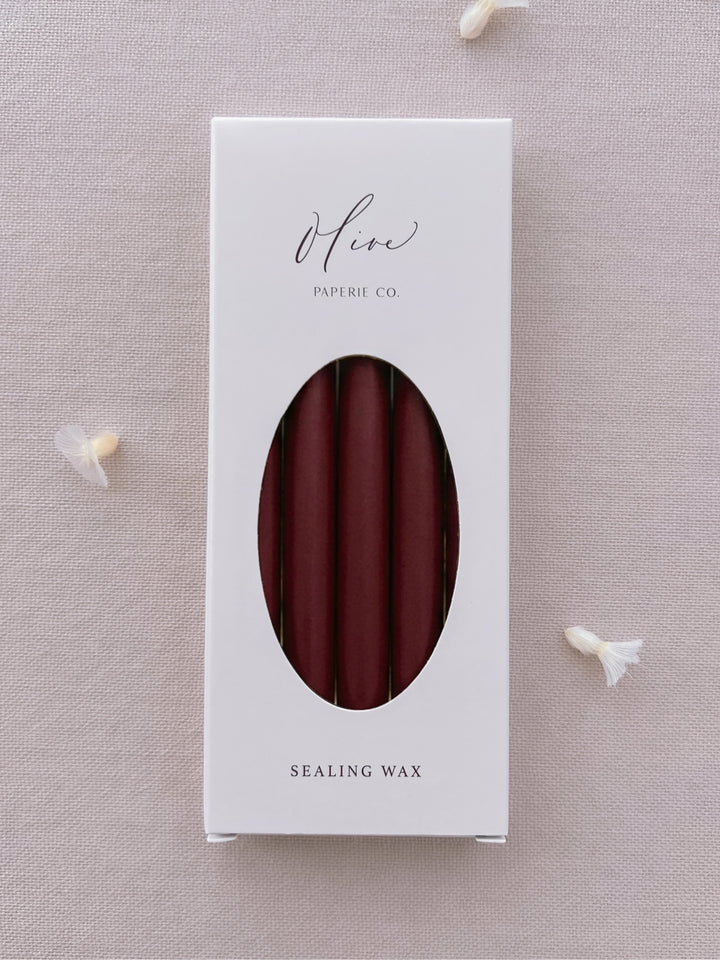 A pack of five dark red burgundy glue gun sealing wax sticks