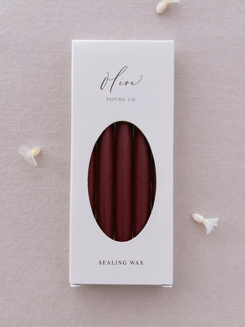A pack of five dark red burgundy glue gun sealing wax sticks