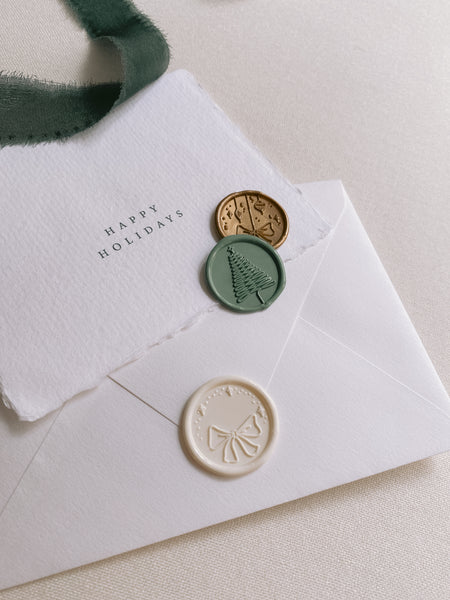 Christmas wax seals in color gold, sage green, off-white on white handmade paper Christmas card and envelope set