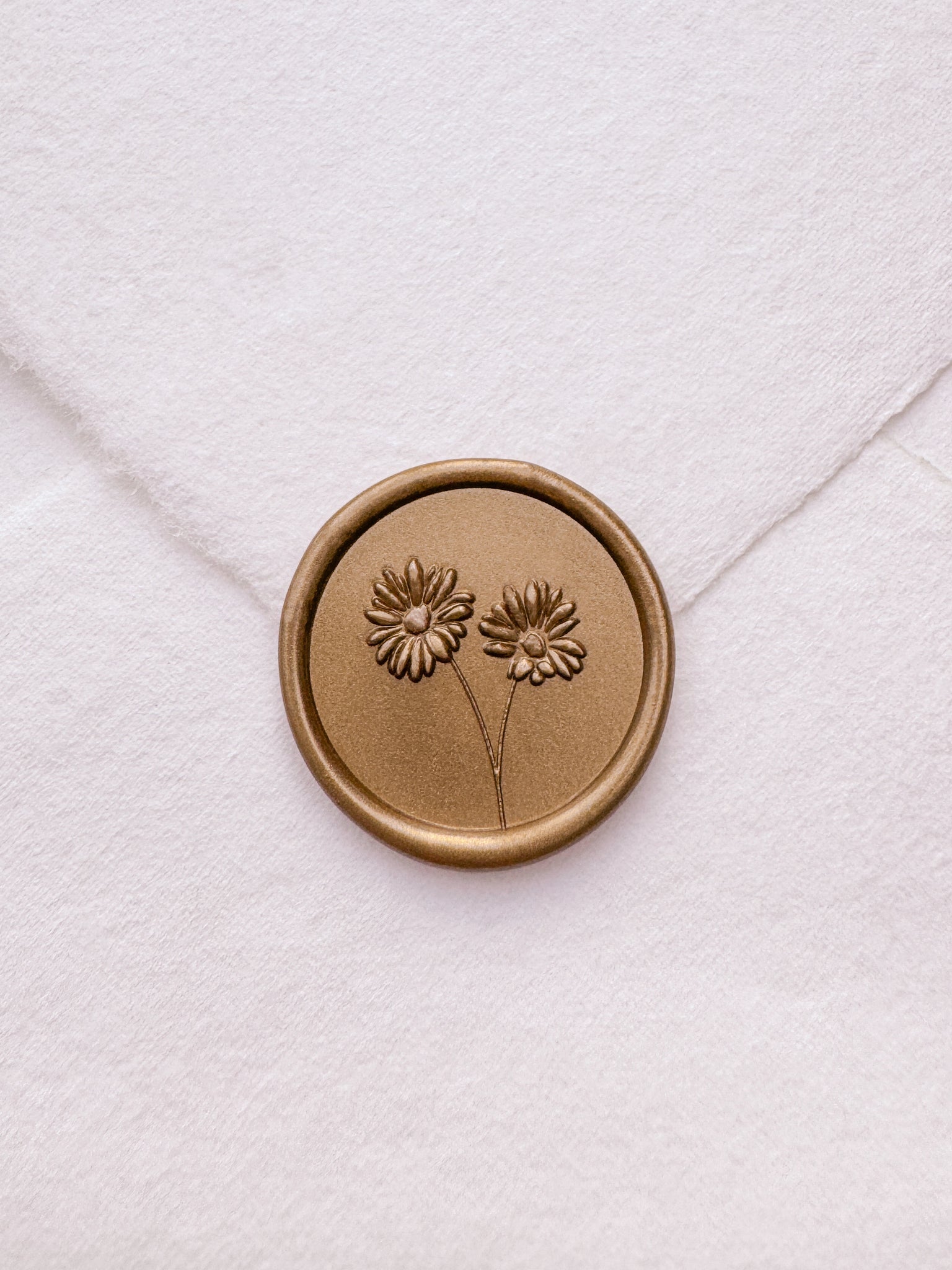 Daisies gold wax seal on white handmade paper envelope
