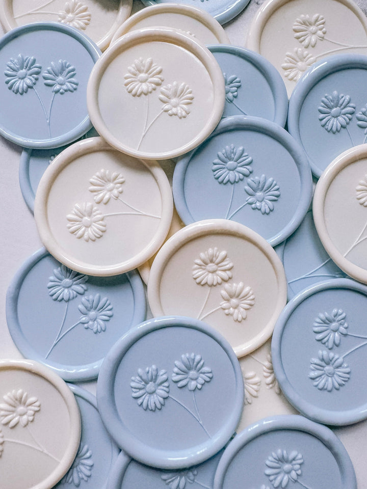 Off-white and light blue daisies wax seals with 3D engraving