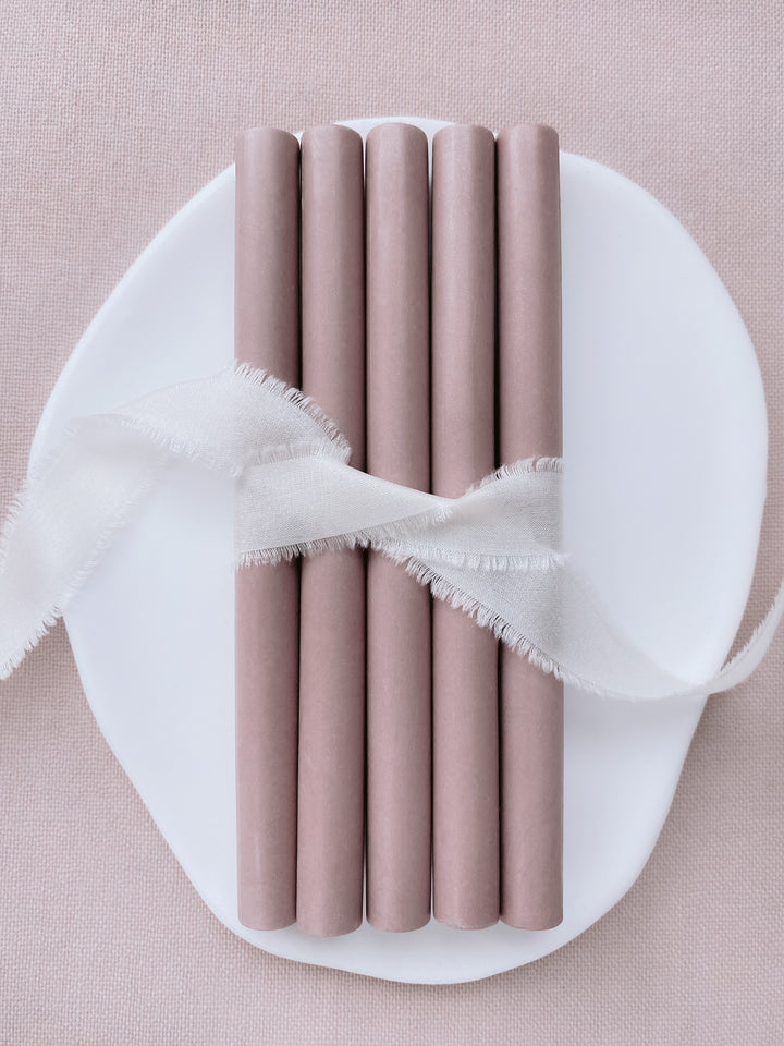 set of 5 glue gun sealing wax sticks in nude brown color tied with soft white silk ribbon