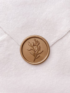 Eucalyptus leaf wax seal in gold on handmade paper envelope