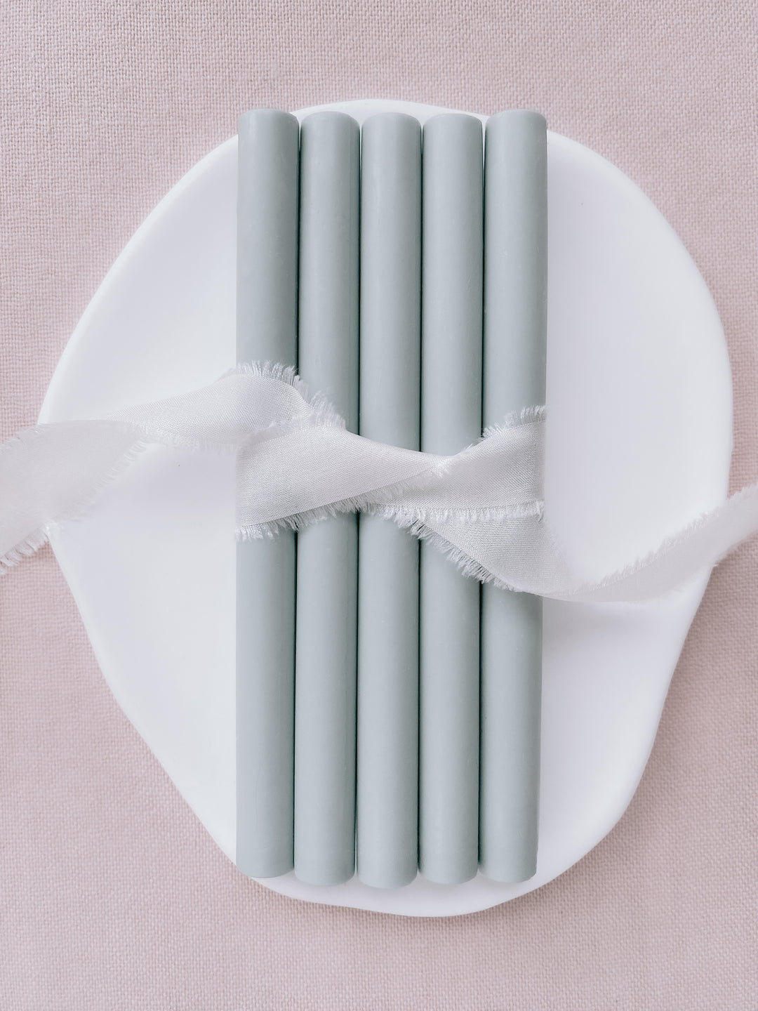 a set of 5 mint color glue gun sealing wax sticks tied with soft white silk ribbon