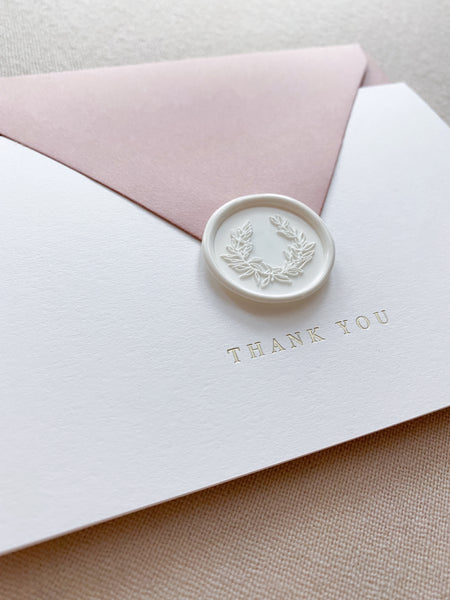 Gold foil press white thank you card with blush envelope and wreath design white wax seal
