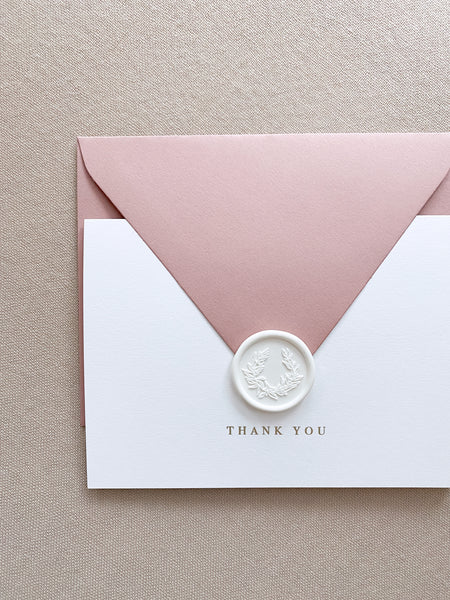 Gold foil press white thank you card with blush envelope and wreath design white wax seal