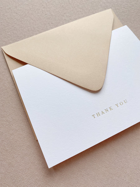 Gold foil press white thank you card with sand colored envelope