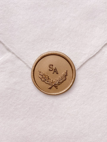 Leaf wreath monogram gold custom wax seal on beige handmade paper envelope