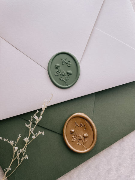 sage green and gold monogram wax seals with 3D floral engraving 
