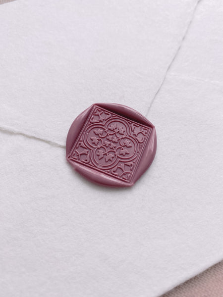 Amira moroccan tile wax seal in dusty rose on beige handmade paper envelope