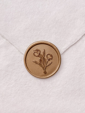 Gold flower bouquet wax seal on beige handmade paper envelope