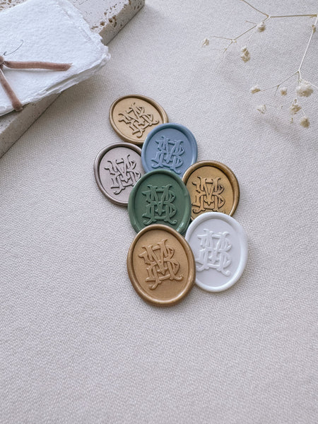 Oval vintage monogram wax seals in various colors