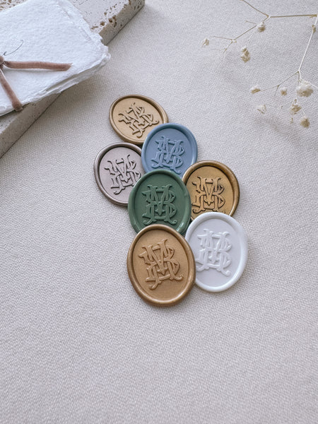 Oval vintage monogram wax seals in various colors