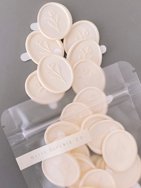 Simple flower oval wax seal stickers in off-white inside clear packaging bag