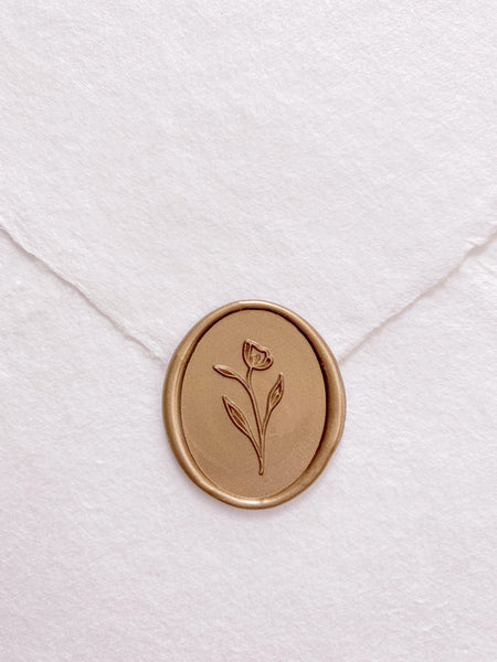 Simple flower oval wax seal on white handmade paper envelope