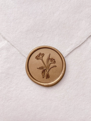 Gold flower bouquet wax seal on beige handmade paper envelope