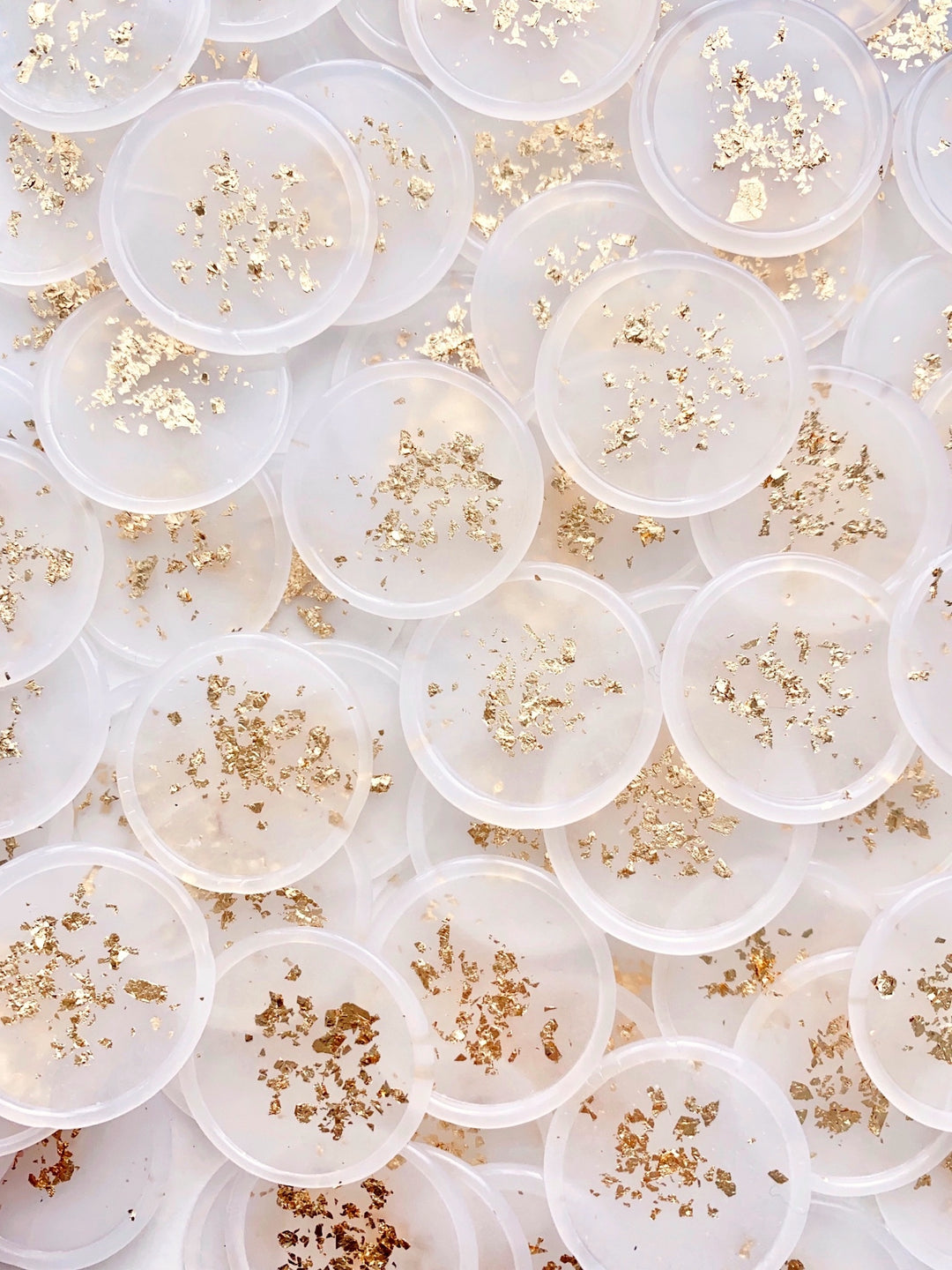 Clear wax seals embellished with gold leaf flakes