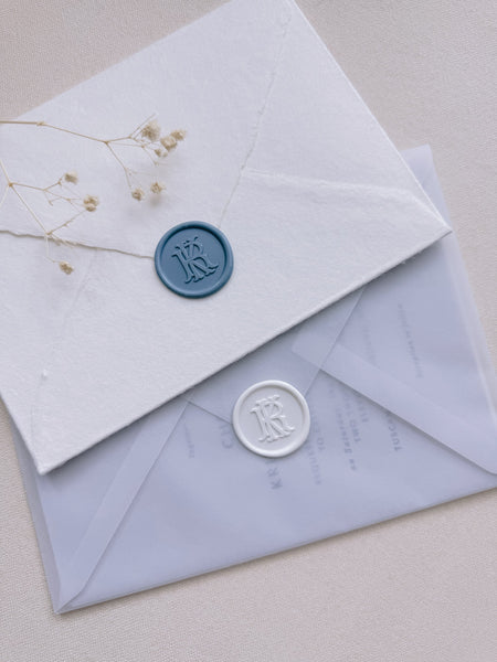 French blue and white vintage monogram wax seals on envelopes