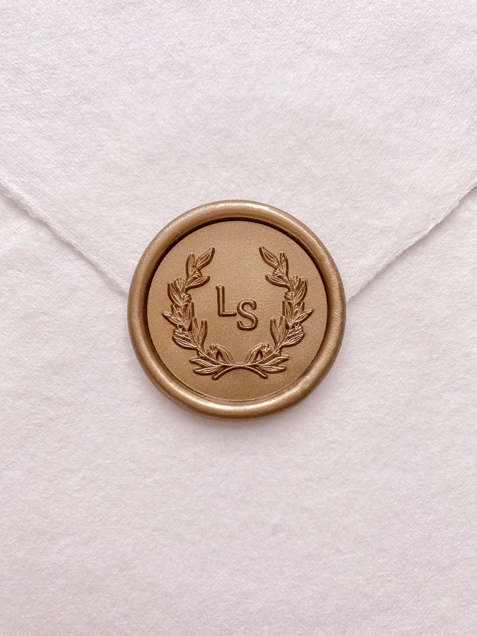 Leaf wreath monogram gold custom wax seal on beige handmade paper envelope