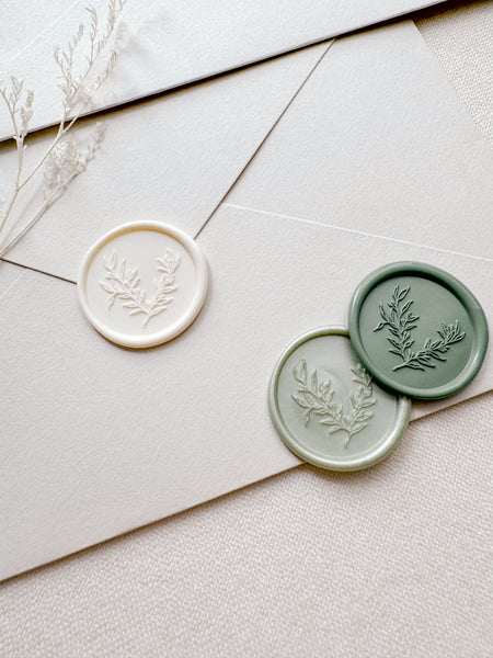 Botanical leaf branch wax seals in off-white, metallic light green and sage green