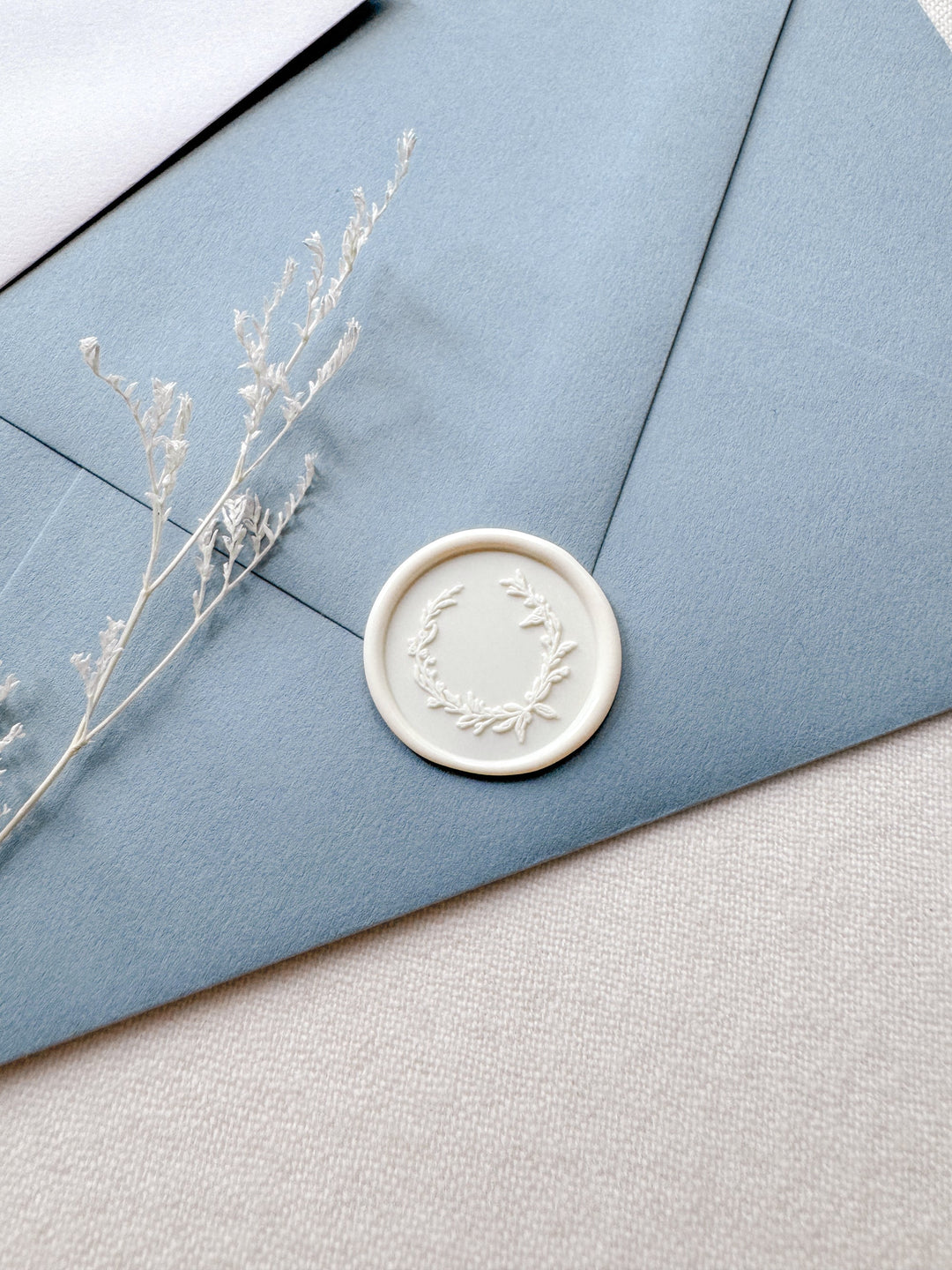 Off-white botanical wreath wax seal