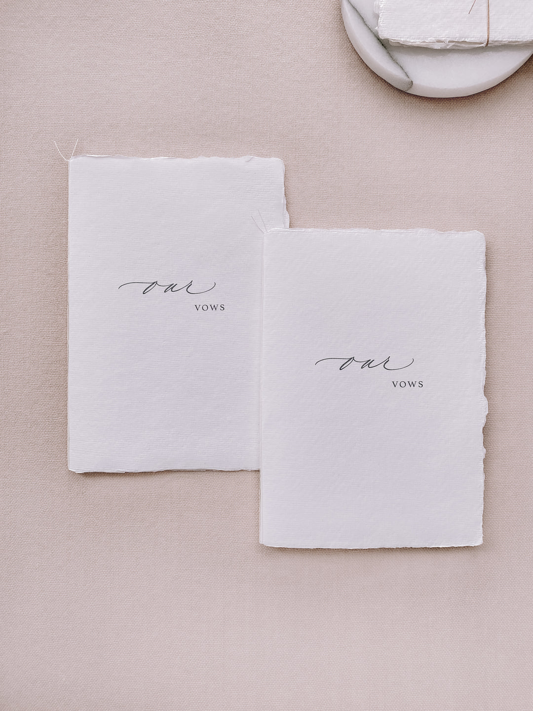our vows white handmade paper vow books tied in white twine