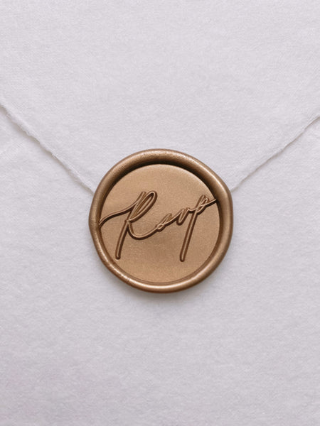 Calligraphy RSVP wax seal in gold on beige handmade paper envelope