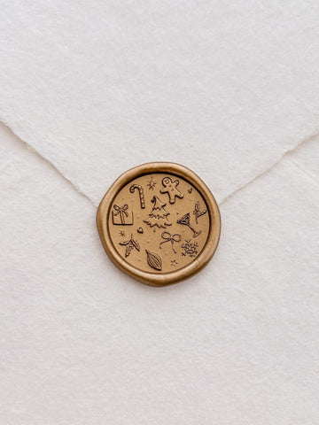 gold Christmas wax seal with festive icons and symbols like Christmas tree, gingerbread man, snowflake, holly and candy cane 