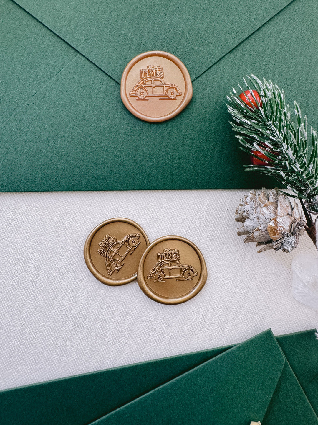 festive car wax seals on Christmas card envelopes