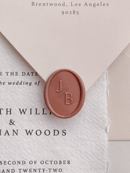 Modern monogram oval wax seal in dusty rose