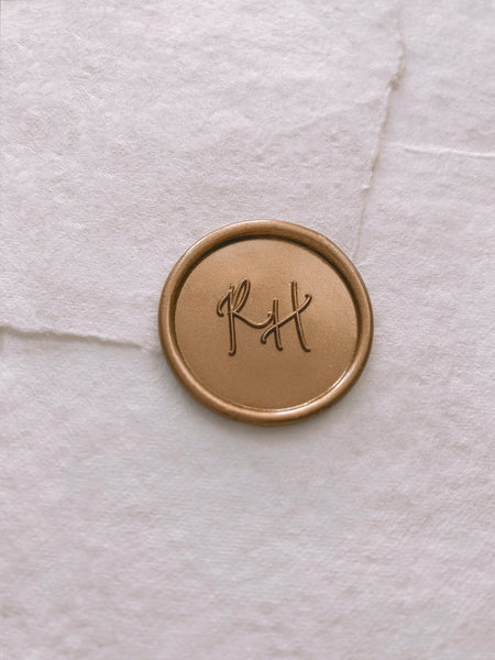 Classic Monogram Round Wax Seal in light gold on handmade paper envelope