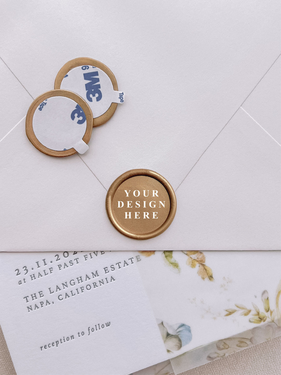 Custom pre-made gold wax seal stickers with text YOUR DESIGN HERE on a wedding invitation card and envelope 
