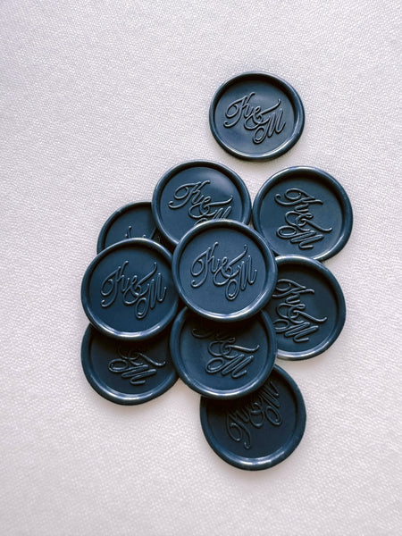 Dark blue calligraphy script monogram wax seals