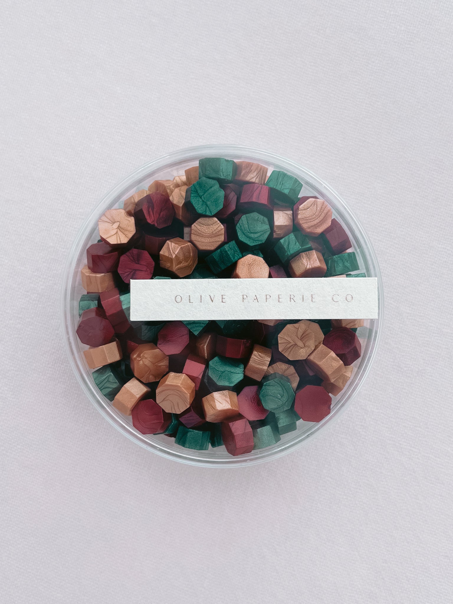 Christmas assorted festive colors sealing wax beads in a mix of gold, red and green