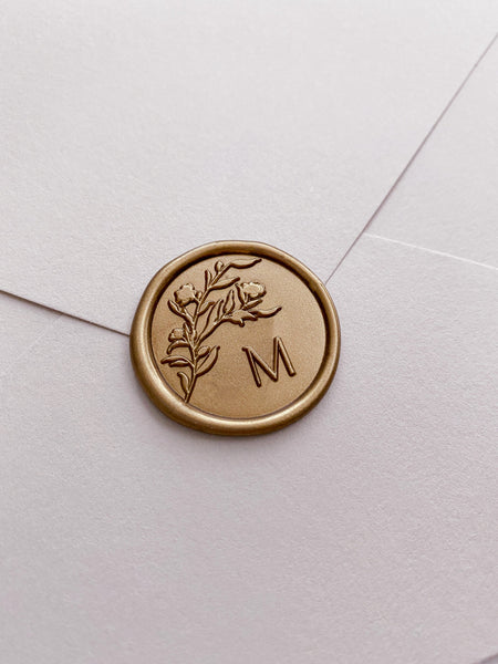Floral crown monogram single initial custom wax seal in gold on beige paper envelope
