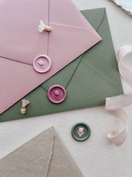 mini 3D flower emoji wax seals in various colors - pink, rose and green