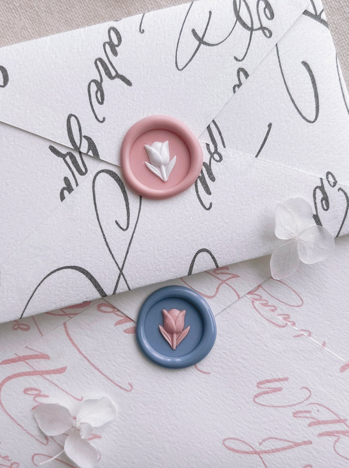 flower emoji mini wax seals in light pink and dusty blue