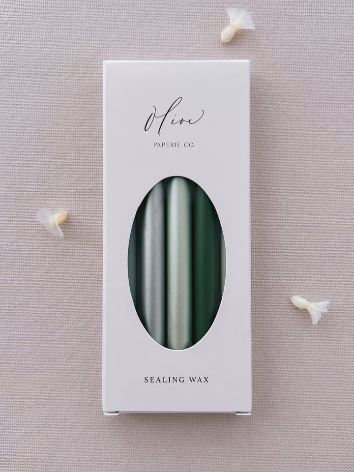 glue gun sealing wax sticks in various green colors and silver