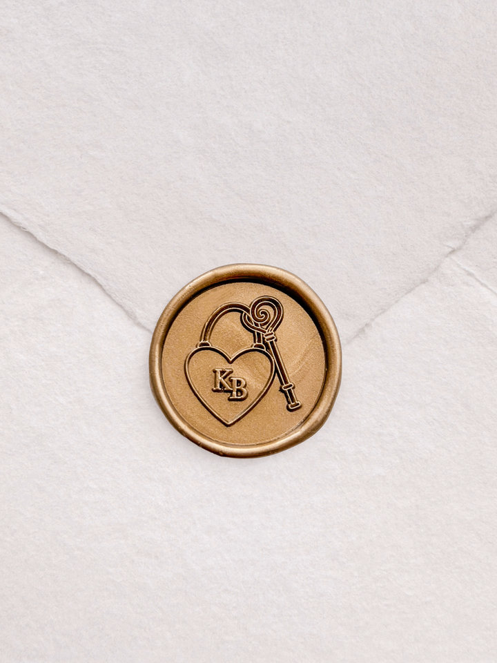 Gold heart lock and key wax seal design personalized with initials 