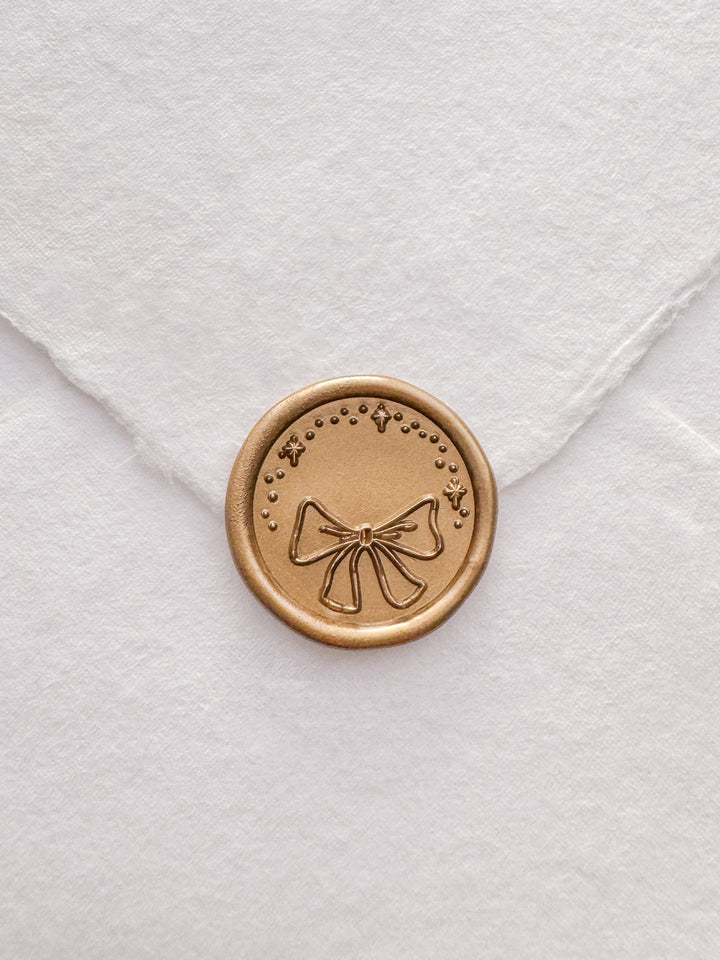 Christmas ribbon bow gold wax seal